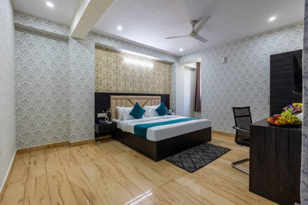 Stay Near Yashobhoomi Delhi | The Castle Villa Hotel Dwarka Comfort Rooms