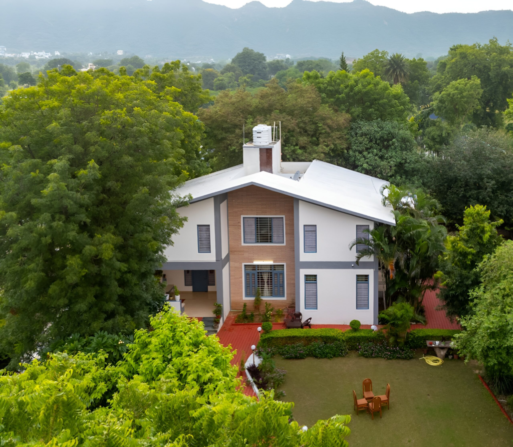 The Front of Castle Villa, surrounded by trees