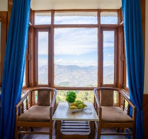Luxury hotel in Kufri under 1000 for couples - snow-view balcony Luxury hotel in Kufri under 1000 for couples - The Castle Villa