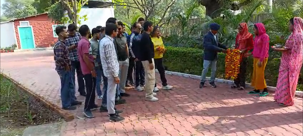 Group of friends/family celebrating on the villa lawn or terrace